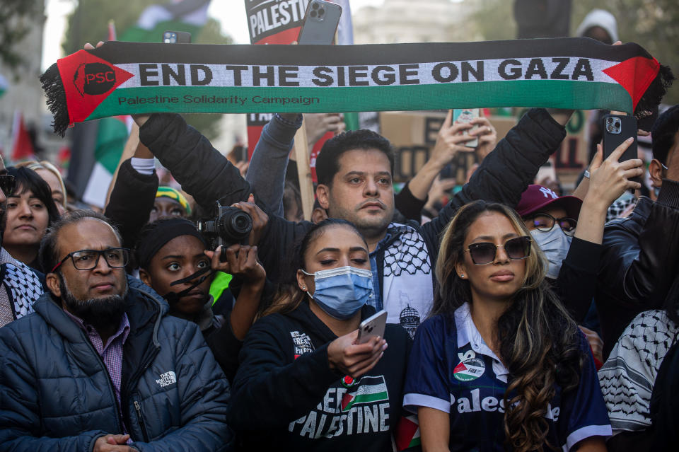 LONDON, ENGLAND - OCTOBER 14: Protestors applaud Jeremy Corbyn at the end of protest rally in Whitehall on October 14, 2023 in London, United Kingdom. Groups supporting Palestine protest at Israel's retaliation to Hamas attacks across the UK this weekend despite the Home Secretary, Suella Braverman, suggesting that waving Palestinian flags and using popular pro-Palestine slogans could be illegal under the Public Order Act in a letter she sent to police chiefs in England and Wales on Tuesday. (Photo by Guy Smallman/Getty Images)