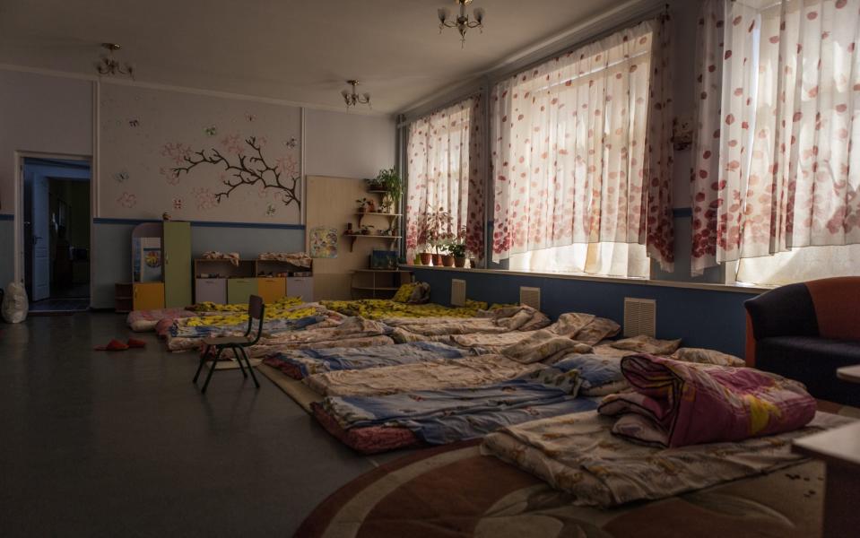 Makeshift beds in a kindergarten in Zaporizhia, Ukraine await refugees from Mariupol on March 23, 2022. - Anadolu Agency/Anadolu