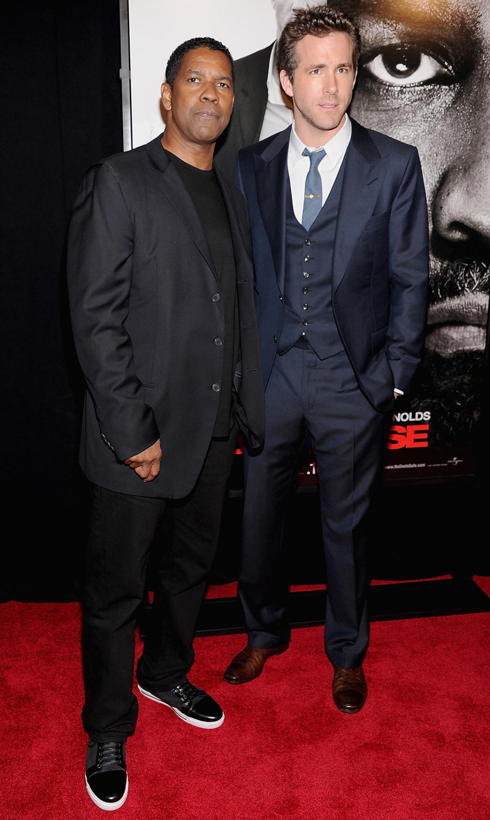 <p>Reynolds, with co-star Denzel Washington, at the New York premiere on Feb. 7, 2012. (Photo: Jamie McCarthy/Getty Images) </p>