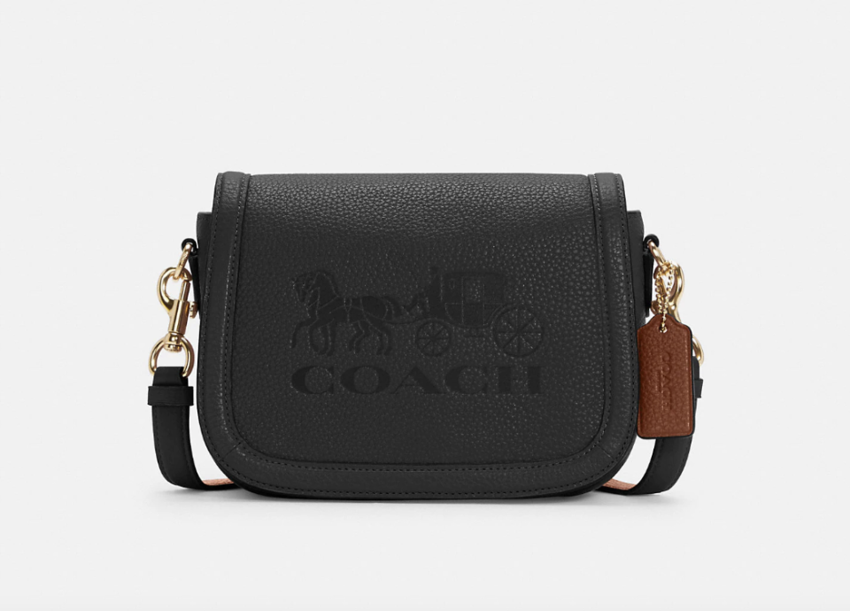 Coach Outlet Saddle Bag With Horse And Carriage in Gold/Black/Redwood (Photo via Coach Outlet)