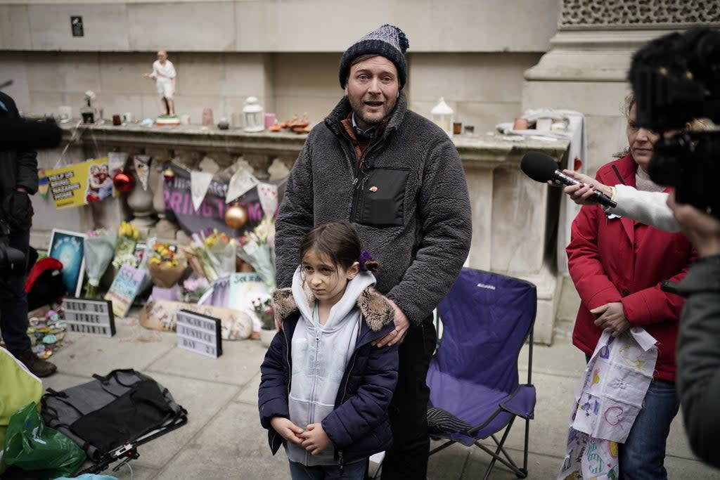 Richard Ratcliffe, the husband of Iranian detainee Nazanin Zaghari-Ratcliffe, with his daughter Gabriella (Aaron Chown/PA) (PA Wire)