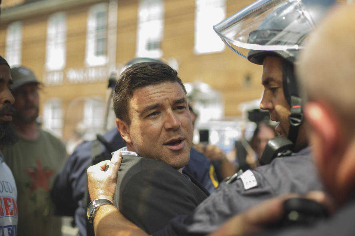 Jason Kessler is forcibly removed by Virginia state police during an attempted press conference in the wake of a deadly white supremacist rally in Charlottesville. (Photo: Shay Horse/NurPhoto via Getty Images)