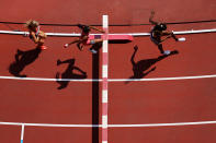 <p>Peruth Chemutai (R) of Team Uganda competes in round one of the Women's 3000m Steeplechase heats on day nine of the Tokyo 2020 Olympic Games at Olympic Stadium on August 01, 2021 in Tokyo, Japan. (Photo by Richard Heathcote/Getty Images)</p> 