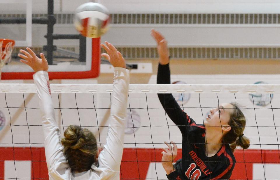 Meadville Area Senior High School junior Emma Parks, right, hits against General McLane in Washington Township on Thursday.