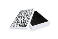 <b>Diane von Furstenberg for Target + Neiman Marcus Jewelry Box</b><br><br> Price: $49.99<br><br> The lacquer, black and white box comes in one of the designer’s signature prints. <br><br>