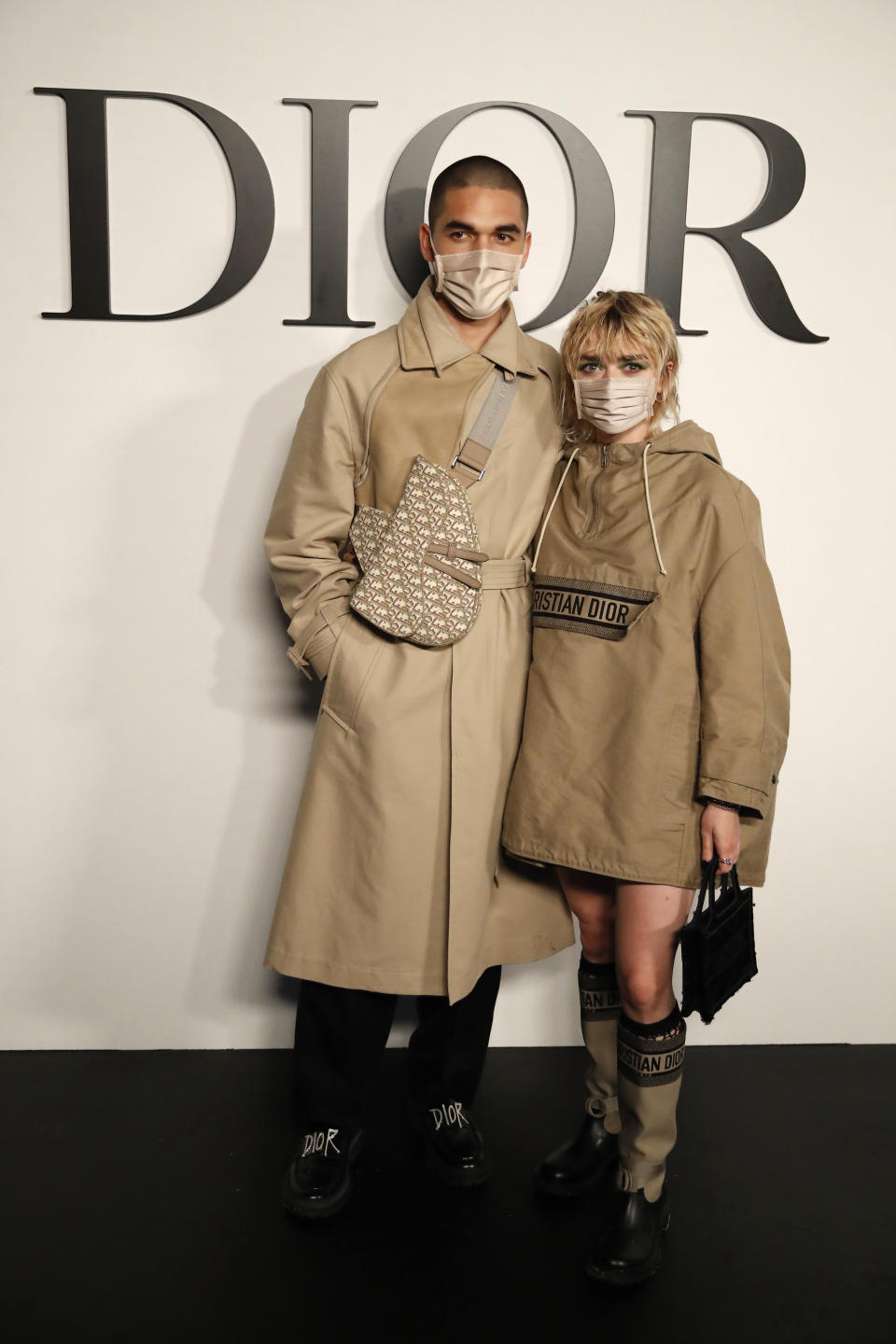 British actress Maisie Williams and Reuben Selby pose before Dior's Spring-Summer 2021 fashion collection Tuesday, Sept. 29, 2020 before the show during the Paris fashion week. (AP Photo/Francois Mori)