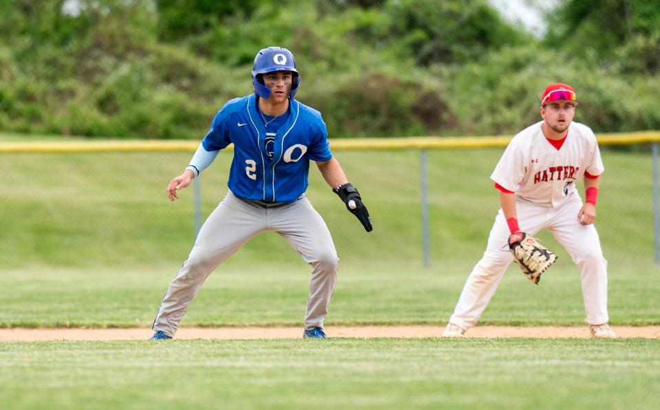 Quakertown's Danny Qualteria (2) takes a lead off of first base against Hatboro-Horsham.