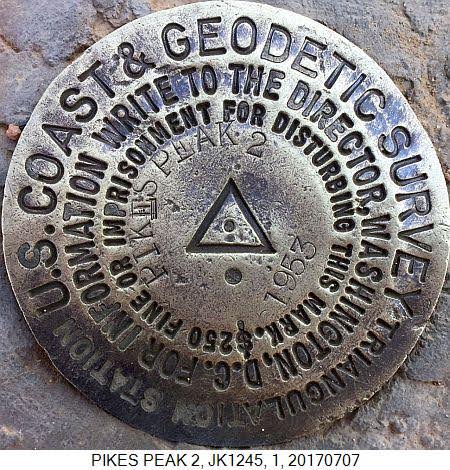 Triangulation station disk on Pikes Peak. (Photo: National Geodetic Survey)