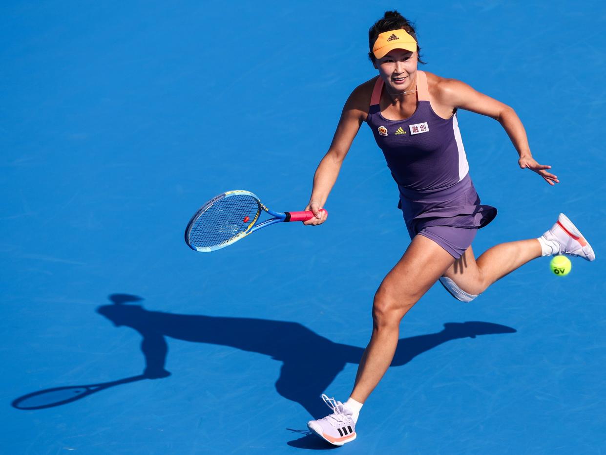 Shuai Peng of China returns a shot during the match against Ekaterina Alexandrova of Russia on Day 4 of 2020 WTA Shenzhen Open at Shenzhen Longgang Sports Center on January 8, 2020 in Shenzhen, China