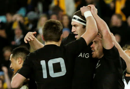 Australia Rugby Union - Bledisloe Cup - Australia's Wallabies v New Zealand All Blacks - Olympic Stadium, Sydney, Australia - 20/8/16 New Zealand's centre Ryan Crotty (R) celebrates with team mates after scoring a first try. REUTERS/Jason Reed