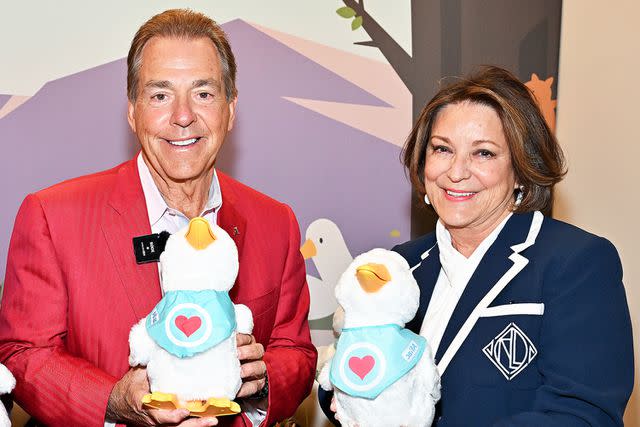 <p>Derek White/Getty</p> Nick Saban and Terry Saban attend an event with Aflac to deliver My Special Aflac Ducks to Children's Of Alabama in June 2023.