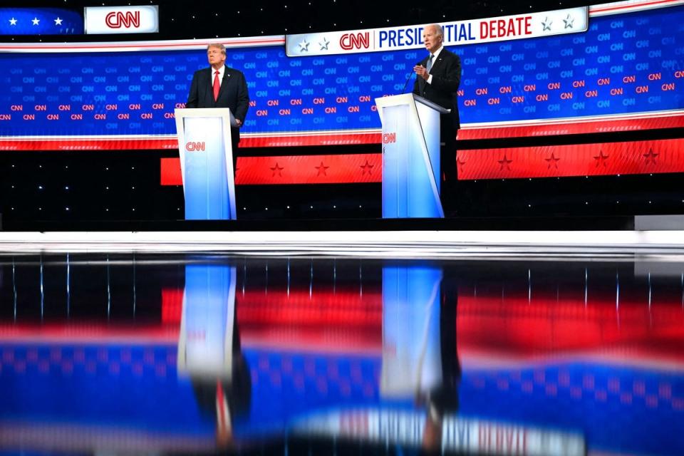 Donald Trump and Joe Biden take part in the TV debate on CNN (AFP via Getty Images)