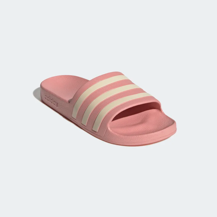 <h2>Adidas Adilette Aqua Slides</h2> <br>If you haven't yet refreshed your spring footwear wardrobe, these iconic and classic slides are a no-brainer way to add a pop of happiness to any indoor-outdoor fit. <br><br><strong>Adidas</strong> Adilette Aqua Slides, $, available at <a href="https://go.skimresources.com/?id=30283X879131&url=https%3A%2F%2Fwww.adidas.com%2Fus%2Fadilette-aqua-slides%2FGZ5877.html" rel="nofollow noopener" target="_blank" data-ylk="slk:Adidas" class="link ">Adidas</a>