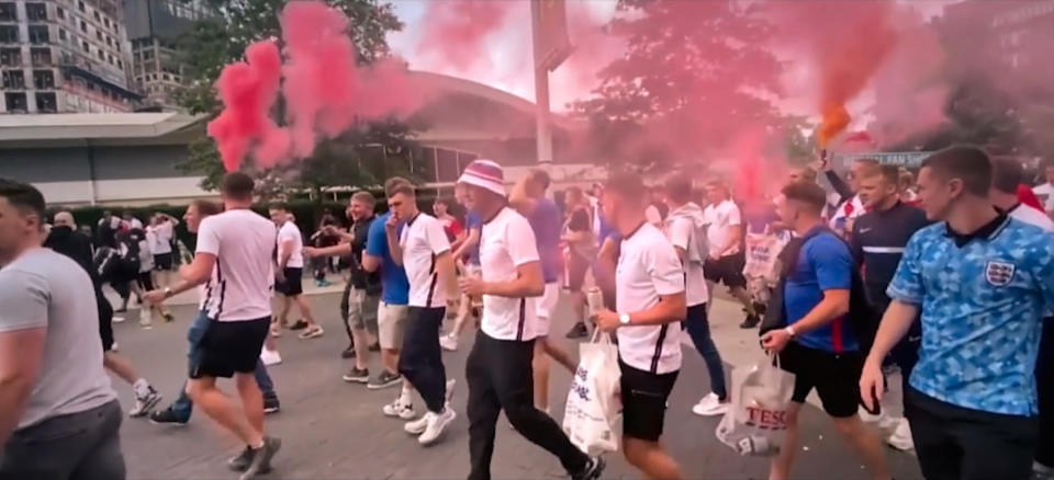 England fans waving flares at the Euro 2020 final