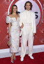 Ericka Hunter, left, and Aaron Tveit arrive at the 74th annual Tony Awards at Winter Garden Theatre on Sunday, Sept. 26, 2021, in New York. (Photo by Evan Agostini/Invision/AP)