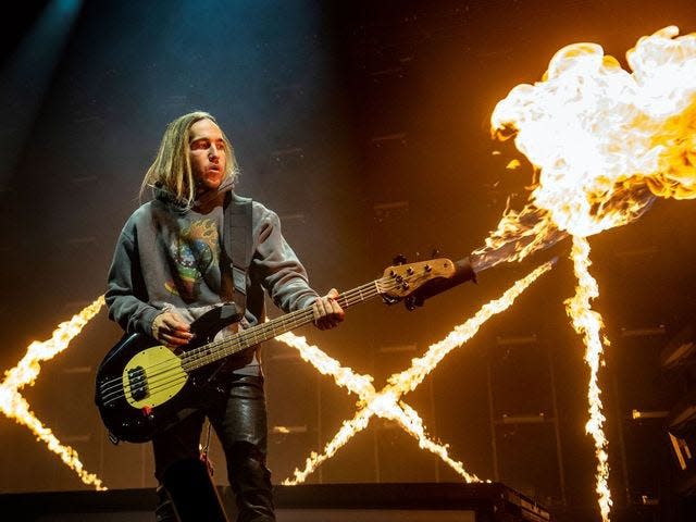 Pete Wentz lights it up as Fall Out Boy rocks PPG Paints Arena.