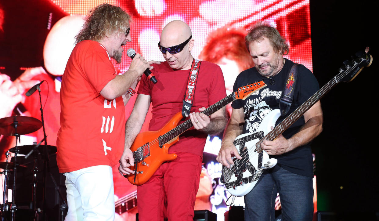  (from left) Sammy Hagar, Joe Satriani and Michael Anthony perform onstage at the Downtown Las Vegas Events Center on October 18, 2014. 