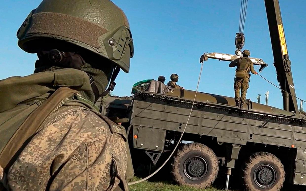 Russian troops prepare a missile launcher for joint Russian-Belarusian drills