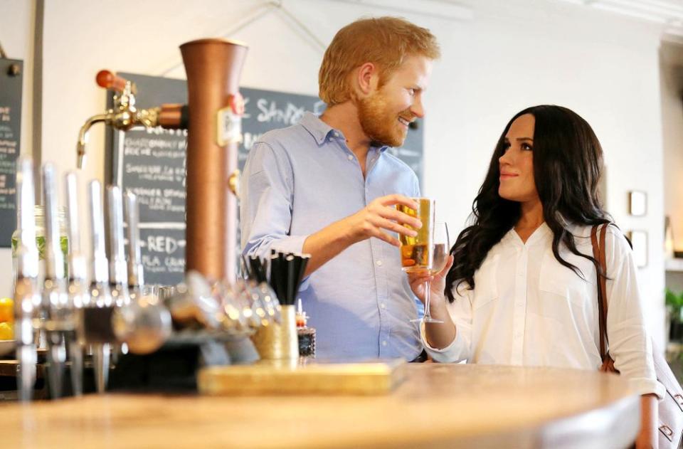 Meghan Markle and Prince Harry in Ugly Christmas Sweaters