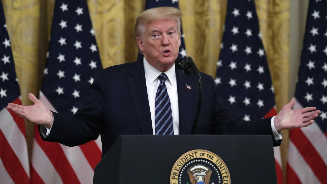 President Donald Trump answers questions from reporters during an event in the East Room of the White House on April 30, 2020, in Washington. (Alex Brandon/AP)