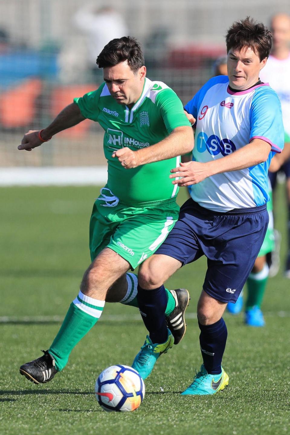 Greater Manchester's Mayor Andy Burnham (left) taking part in the Labour v Journalists annual conference football match (PA)