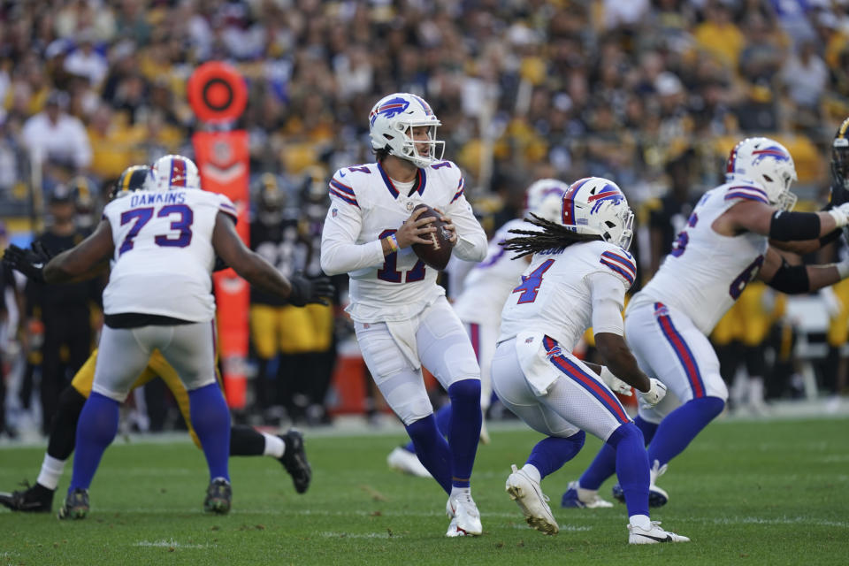 Buffalo Bills quarterback Josh Allen (17) looks to pass in the first half of an NFL preseason football game against the Pittsburgh Steelers, in Pittsburgh, Saturday, Aug. 19, 2023. (AP Photo/Matt Freed)