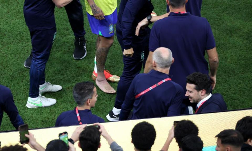 Neymar leaves the field with a swollen ankle after the win over Serbia.