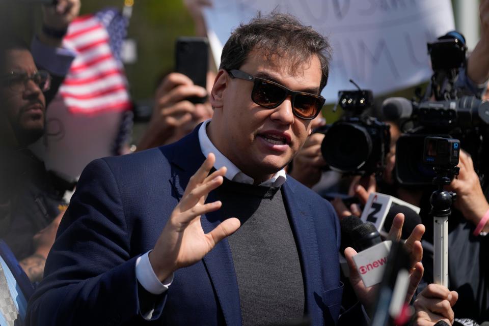 U.S. Rep. George Santos answers questions from members of the media, Wednesday, May 10, 2023, outside federal court in Central Islip, N.Y. Santos pleaded not guilty to charges alleging a financial fraud at the heart of a political campaign built on dubious boasts about his personal wealth and business success. (AP Photo/Seth Wenig)