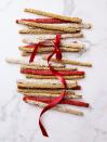 <p>For a more sophisticated — yet still magical! — take on gingerbread, slice up rolled-out dough with a pizza wheel and cover with sprinkles.</p><p>Get the <a href="https://www.goodhousekeeping.com/food-recipes/dessert/a35761/gingerbread-wands/" rel="nofollow noopener" target="_blank" data-ylk="slk:Gingerbread Wands recipe;elm:context_link;itc:0;sec:content-canvas" class="link "><strong>Gingerbread Wands recipe</strong></a>. </p>