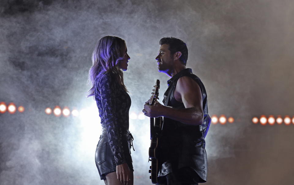 This July 25, 2019, photo provided by Jon-Paul Bruno shows Shannon Haley and Ryan Michaels shooting a music video at Levi’s Stadium in Santa Clara, Calif. NFL players’ dreams usually center on scoring touchdowns and making game-saving tackles. Then they watch videos of their performances. It’s not that much different for musicians, particularly the husband/wife country duo of Shannon Haley and Ryan Michaels. Their big play occurred in Levi’s Stadium, home of their longtime favorite team, the 49ers. (Jon-Paul Bruno via AP)