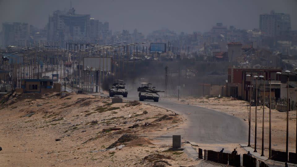 Israeli army tanks are seen in the central Gaza Strip on Saturday, May 18, 2024. - Abdel Kareem Hana/AP