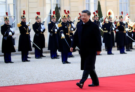Chinese President Xi Jinping arrives for a meeting with French President Emmanuel Macron at the Elysee Palace in Paris, France, March 25, 2019. REUTERS/Gonzalo Fuentes