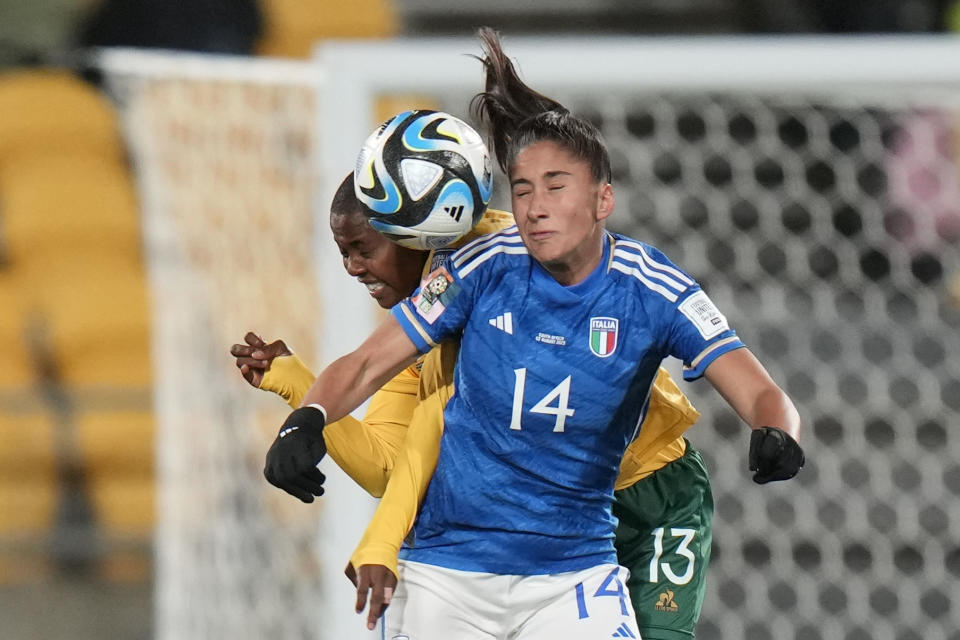 Italy's Chiara Beccari, front, fights for the ball against South Africa's Bambanani Mbane during the Women's World Cup Group G soccer match between South Africa and Italy in Wellington, New Zealand, Wednesday, Aug. 2, 2023. (AP Photo/Alessandra Tarantino)