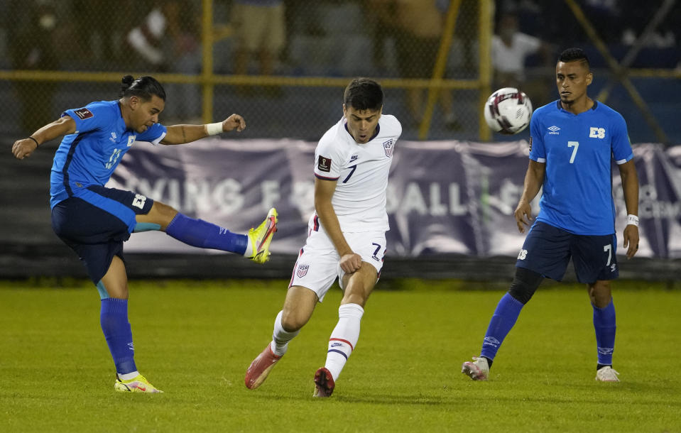El Salvador's Alex Larin, left, and United States' Gio Reyna, fight for the ball during a qualifying soccer match for the FIFA World Cup Qatar 2022 at Cuscatlan stadium in San Salvador, El Salvador, Thursday, Sept. 2, 2021. (AP Photo/Moises Castillo)