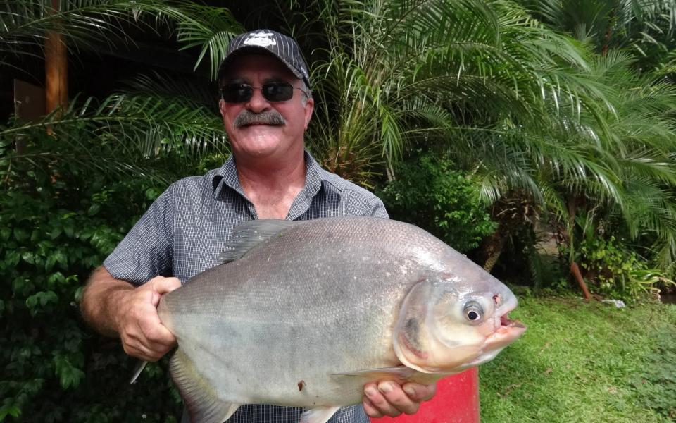 Mr Darmody holds fish