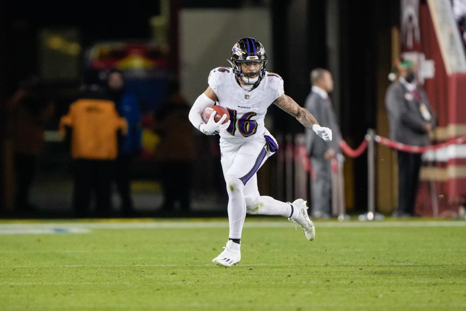 SANTA CLARA, CALIFORNIA – DECEMBER 25: Tylan Wallace #16 of the Baltimore Ravens returns a punt during the third quarter against the San Francisco 49ers at Levi’s Stadium on December 25, 2023 in Santa Clara, California. (Photo by Thearon W. Henderson/Getty Images)