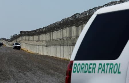 U.S. Border Patrol vehicles are patroling along the U.S. Mexico border area in San Diego, California, U.S., on April 21, 2017. REUTERS/Mike Blake/Files