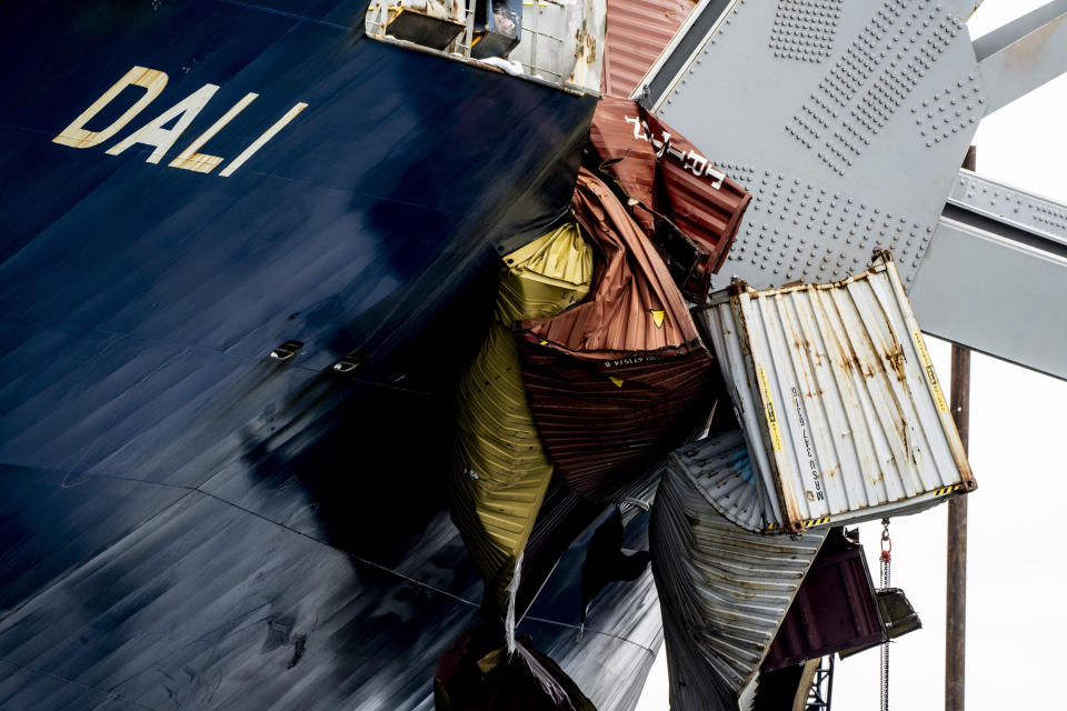 A section of the Dali, a massive container ship from Singapore, is seen as the vessel still sits amid the wreckage and collapse of the Francis Scott Key Bridge in the Baltimore port, Monday, April 1, 2024. (Kaitlin Newman/The Baltimore Banner via AP)