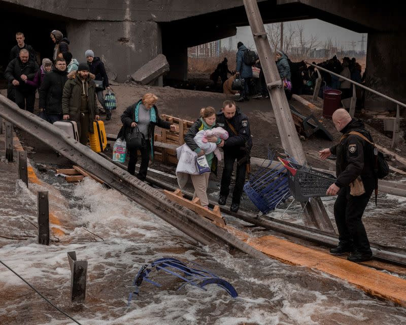 Local residents flee from Irpin in Kyiv region