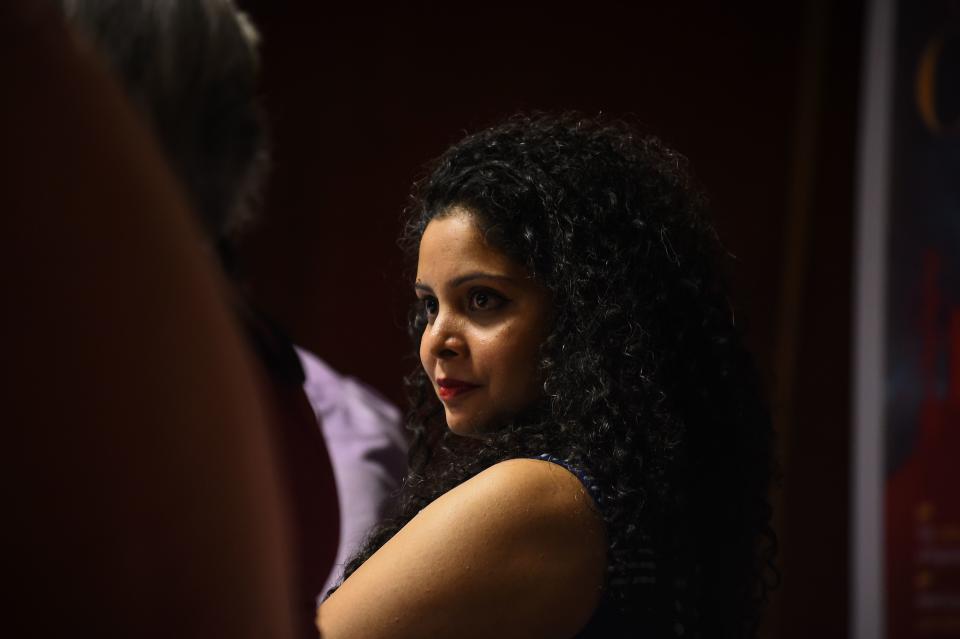 In this photograph taken on May 27, 2016, Indian journalist and author, Rana Ayyub looks on during the launch of her self published book 'Gujarat Files' in New Delhi.  / AFP / CHANDAN KHANNA        (Photo credit should read CHANDAN KHANNA/AFP via Getty Images)