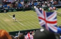 Tennis - Great Britain v France - Davis Cup World Group Quarter Final - Queen?s Club, London - 18/7/15 Great Britain's Andy Murray serves during his doubles match Action Images via Reuters / Andrew Boyers Livepic