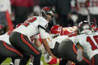 Tampa Bay Buccaneers quarterback Tom Brady takes a snap during the first half of the NFL Super Bowl 55 football game against the Kansas City Chiefs Sunday, Feb. 7, 2021, in Tampa, Fla. (AP Photo/Gregory Bull)