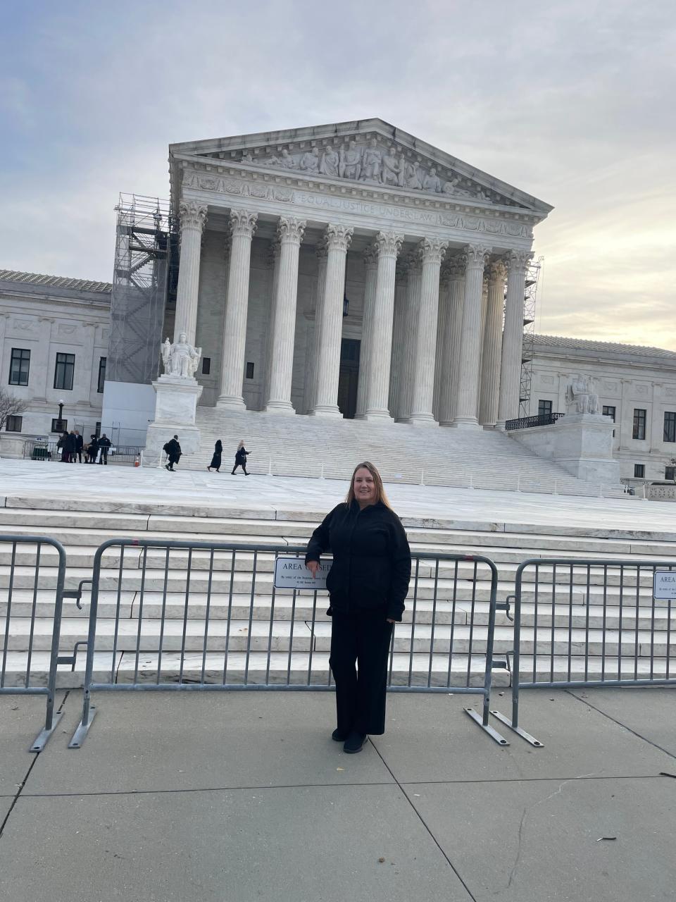 Kathy Strain, who lost her nephew Tommy to an opioid overdose, is pictured in front of the U.S. Supreme Court. Strain is an advocate with the nonprofit Partnership to End Addiction for other families dealing with substance use disorder.