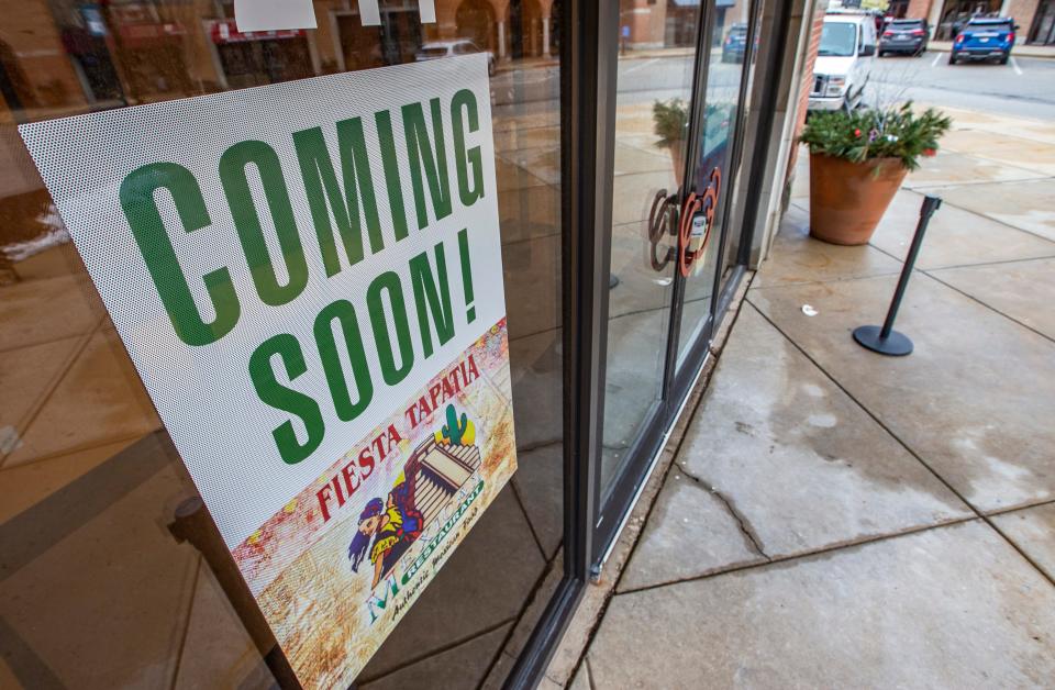 A "Coming Soon!" sign is posted at the new location for Fiesta Tapatia, expected to open in 2022, on Wednesday, Dec. 29, 2021, at Heritage Square in Granger.