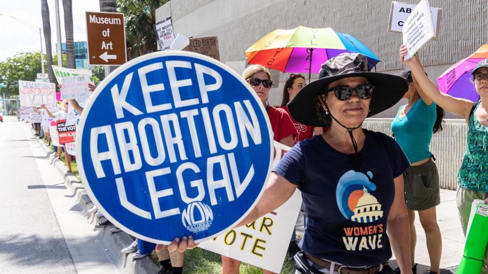 PHOTO: An abortion rights activist holds a sign at a protest in support of abortion access, March To Roe The Vote And Send A Message To Florida Politicians That Abortion Access Must Be Protected And Defended, July 13, 2022, in Fort Lauderdale, Fla. (John Parra/Getty Images )