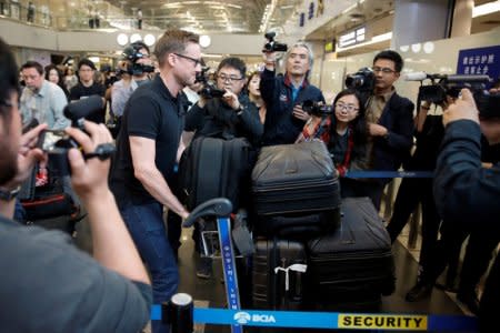 CNN's Will Ripley arrives at Beijing aiport to board a plane to North Korea in Beijing, China, May 22, 2018. REUTERS/Thomas Peter