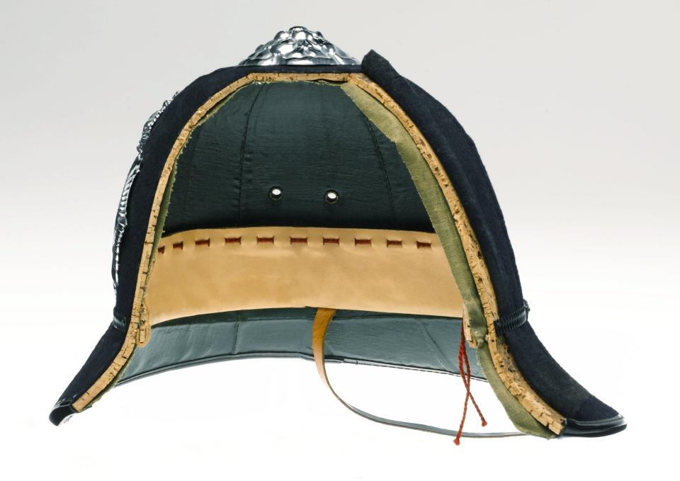 cross-section of the traditional helmet for uniformed policemen - bridgeman