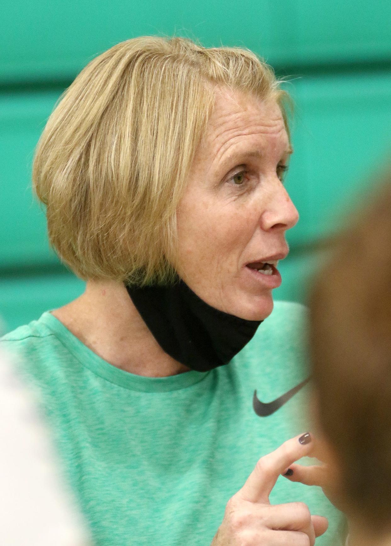 West Branch volleyball coach Penny DeShields talks to the team following their match against Massillon on Thursday, September 30, 2021.