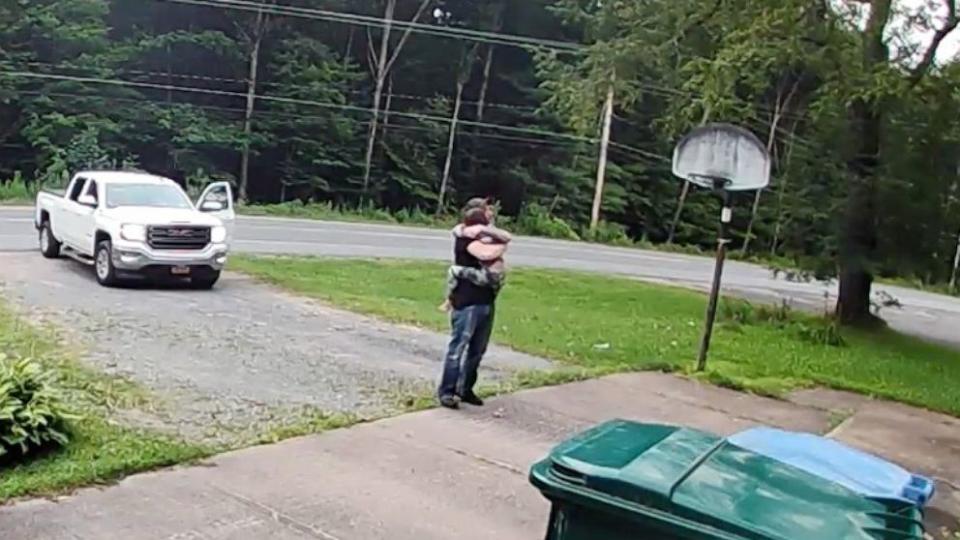 PHOTO: Tyler Lobdell and his son Isaiah were caught on camera in their home's doorbell camera sharing an extra hug before Lobdell headed off to work. (Tyler Lobdell via Storyful)