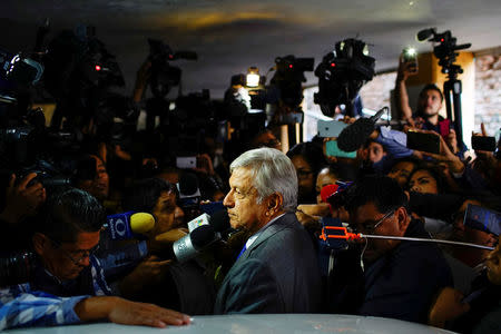 Mexican President-elect Andres Manuel Lopez Obrador speaks to journalists in Mexico City, Mexico, July 6, 2018. REUTERS/Alexandre Meneghini